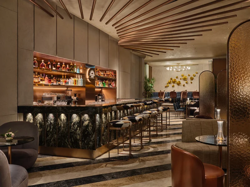 interior photography at 33 club in Singapore. This is a photo of the main bar and seating area showing an overview of the club.