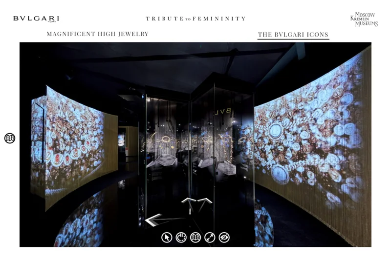 Virtual tour view of dimly lit gallery with illuminated coin-motif projections on large screens flanking glass vitrines