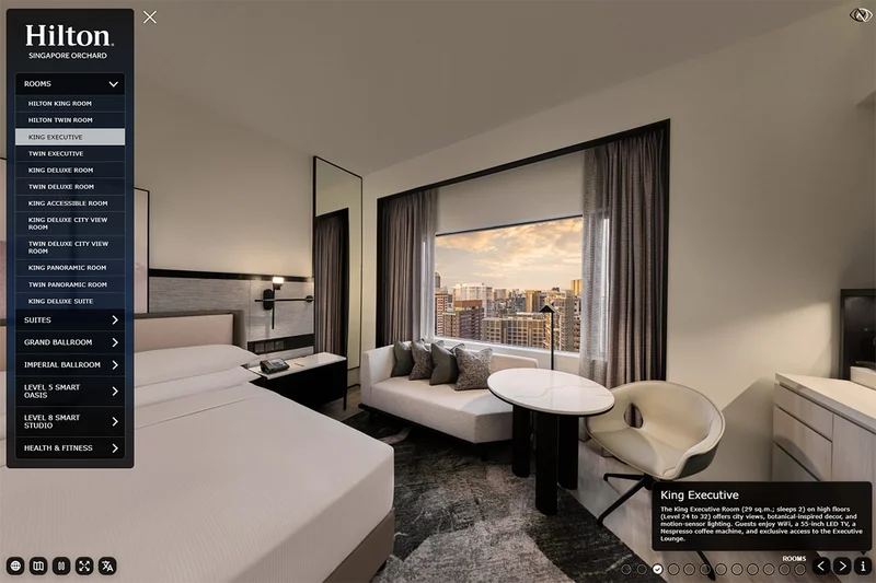 Hilton Singapore Orchard virtual tour of King Executive room with bed, sofa, city skyline view, and room navigation menu