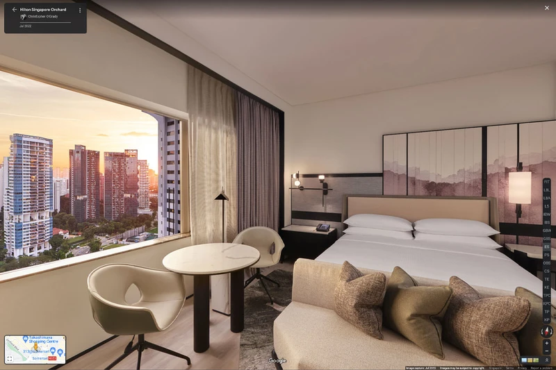 Hilton Singapore Orchard hotel virtual tour showing executive suite with city skyline view