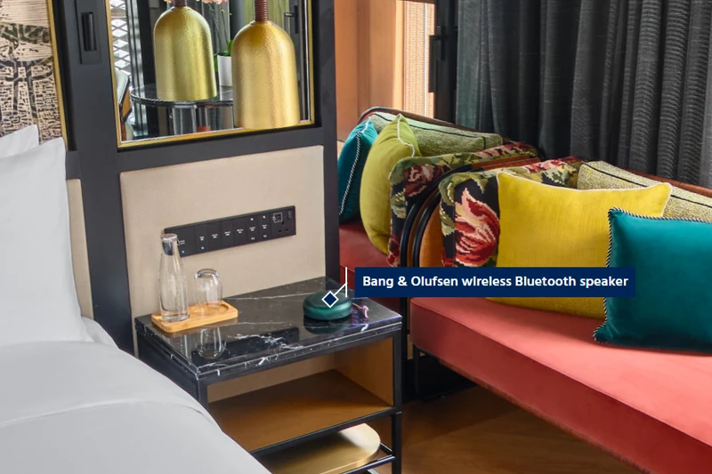 Hotel virtual tour InfoTag feature showing descriptive tag on furniture item