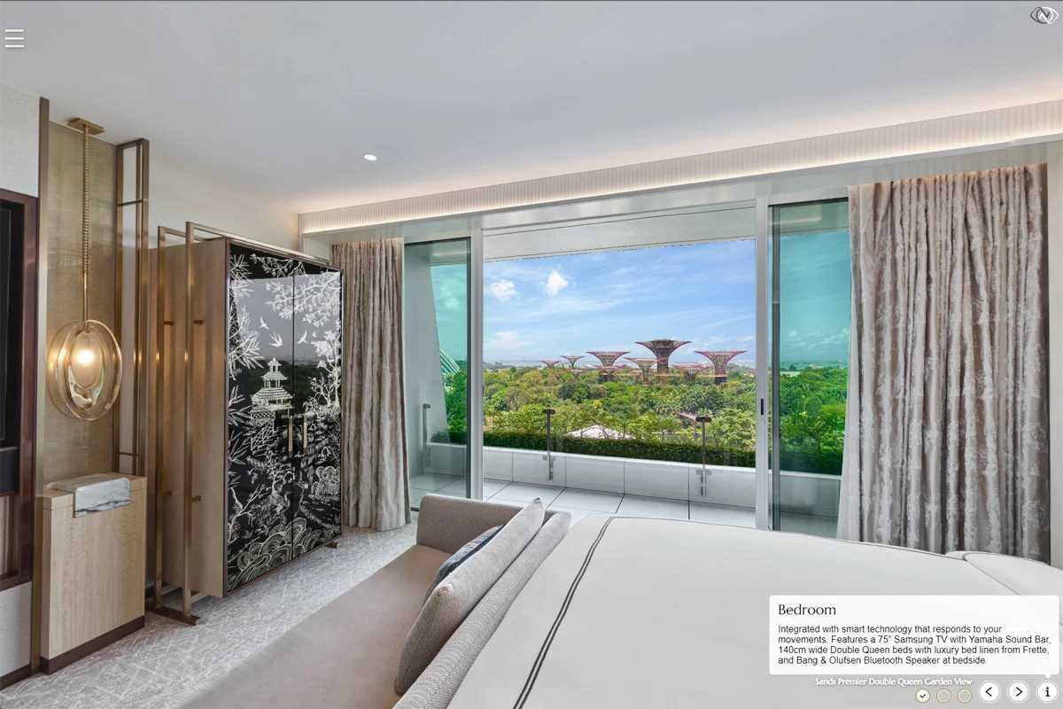 Marina Bay Sands Premier Double Queen Garden View bedroom with Supertree views and decorative wardrobe