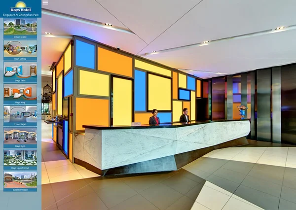 Hotel virtual tour of Days Hotel Singapore front desk with dark marble counter, staff, and decorative blue panels